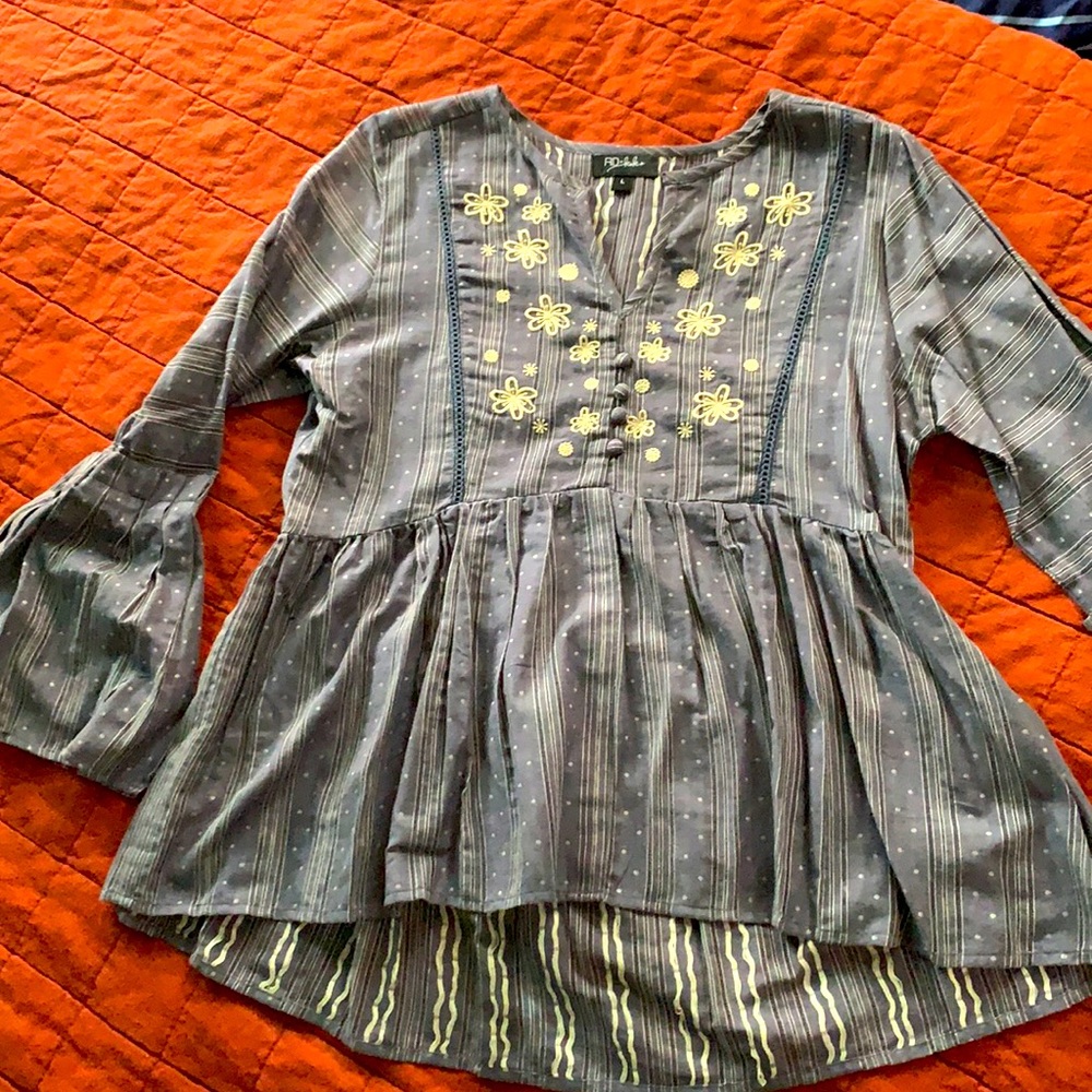 blue-gray top with Oversized cuffs
